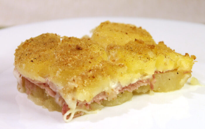 Patate gratinate con prosciutto e mozzarella - Ricette Passo Passo con foto